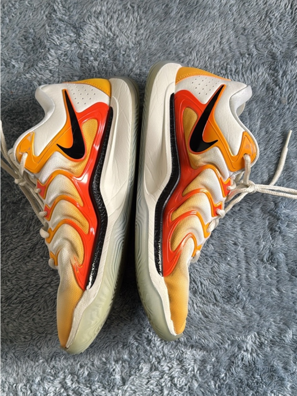 Nike White Sneakers with Orange and Yellow Gradient Swoosh